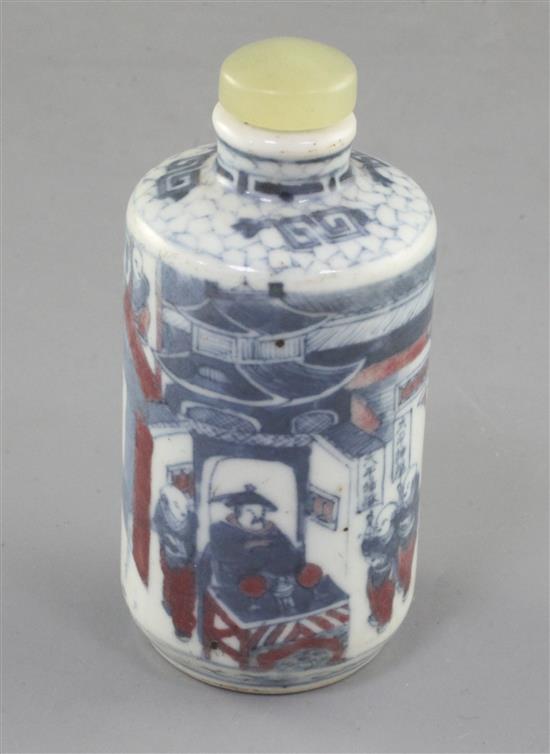 A Chinese underglaze blue and copper red cylindrical snuff bottle, 19th century, height 7.3cm excl. stopper